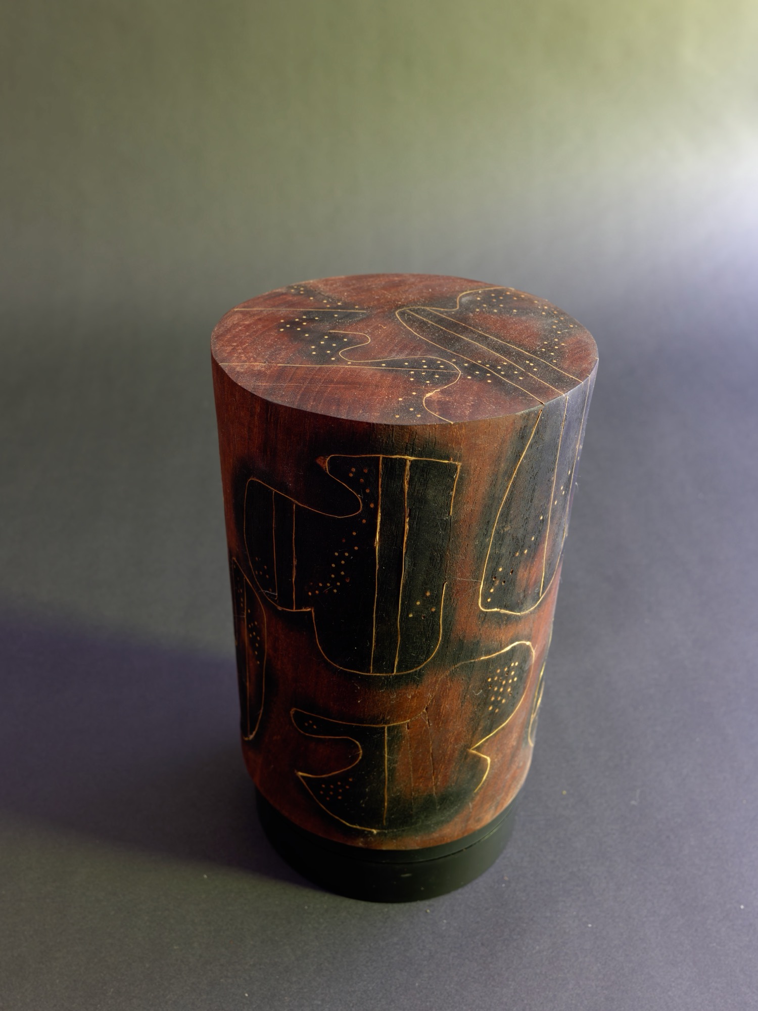 Dream — studio still, the darker face of the cylinder